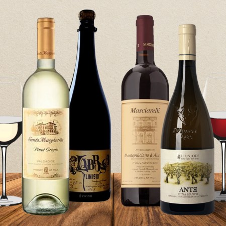 Assortment of wines on beige background