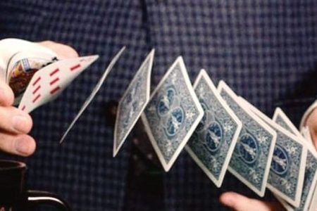 magician shuffling cards